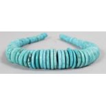 AN ISLAMIC LIGHT BLUE BEAD NECKLACE. 19.5ins long.