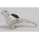 A NOVELTY SILVER PHEASANT PIN CUSHION.