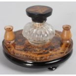 A GOOD 19TH CENTURY TUNBRIDGE WARE CIRCULAR INLAID INKSTAND with glass bottle on three bun feet.