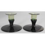 A PAIR OF ART NOUVEAU SQUAT CANDLESTICKS. 3.5ins high.