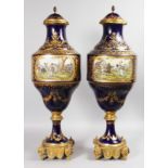 A SUPERB PAIR OF LARGE SEVRES VASES AND COVERS, with rich ormolu mounts and pineapple finials, the