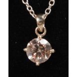 AN 18CT WHITE GOLD SINGLE STONE DIAMOND PENDANT of 1.4CTS, on a chain.