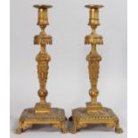 A GOOD LARGE PAIR OF 19TH CENTURY LOUIS XVI ORMOLU CANDLESTICKS with fluted stems on square bases