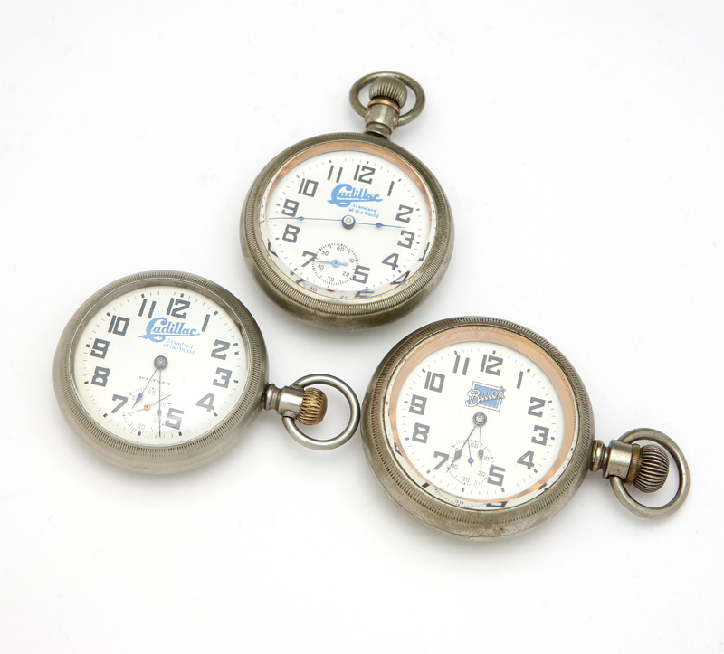 1096  Group of 3 automobile advertising pocket watches Each with vehicle maker's logo, the first: