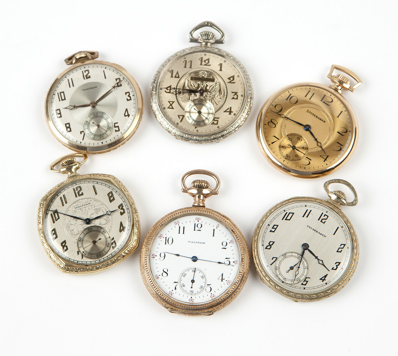 1085  A group of 6 American gold-filled pocket watches The first: A Hampden, circular engine-