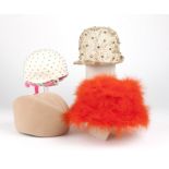 1216  Four ladies hats, including one Yves St. Laurent One ''Happy Cappers'' orange marabou