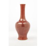 A Chinese monochrome coral red vase