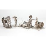 4 Victorian figural silver-plated napkin rings