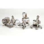 5 Victorian figural silver-plated napkin holders