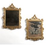 A pair of Italian Rococo carved giltwood mirrors