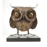 A Curtis Jere patinated metal owl sculpture