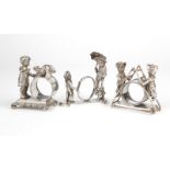 3 Victorian figural silver-plated napkin rings