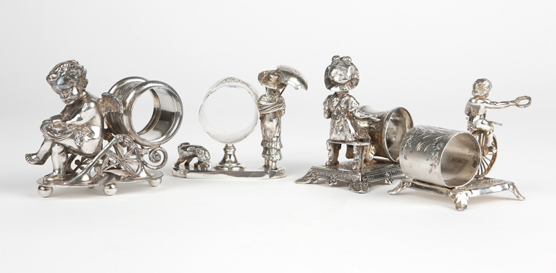 4 Victorian figural silver-plated napkin rings - Image 2 of 2