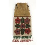 1169 A Woodlands Indian beaded hide bag Early 20th century, rectangular hide bag with drawstring