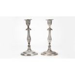 A pair of George III sterling silver candlesticks