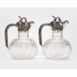 A pair of Posen .800 silver and cut crystal ewers