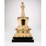 A Tibetan bone-clad model stupa