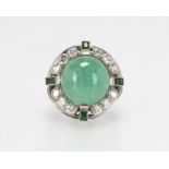 A cabochon emerald and diamond ring