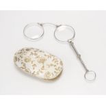 An Edwardian platinum and diamond lorgnette