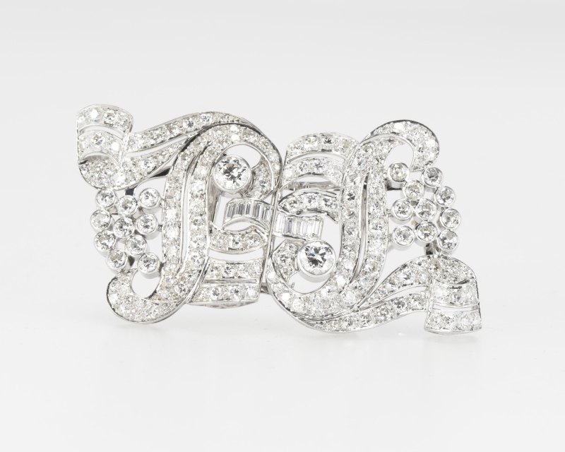 An Art Deco diamond double clip brooch