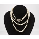 A double-strand cultured pearl & diamond necklace