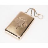 An antique gold dance card purse