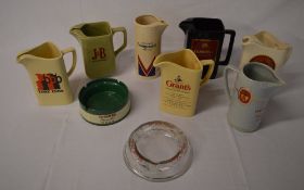 Various pub advertising jugs and ashtray