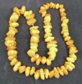 String of 77 irregular form amber beads