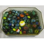 Tin of marbles