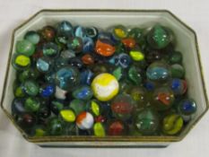 Tin of marbles