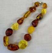 String of 15 various amber beads with si