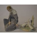 Nao figure of a young lady knelt down (a