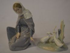 Nao figure of a young lady knelt down (a