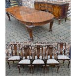 Walnut and mahogany dining suite compris