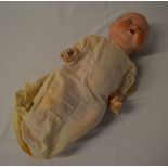 Early 20th century bisque head doll