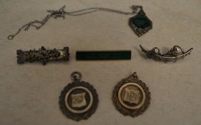 Various silver brooches, silver pendant