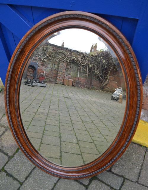 Oval wall mirror