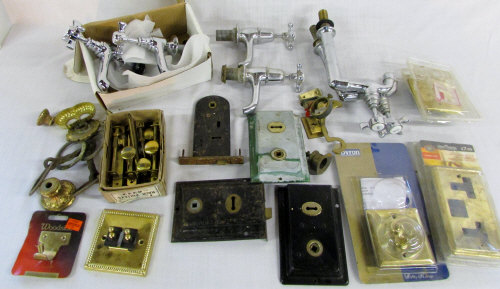 Various taps, brass light fittings, bolt