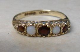 9ct gold white opal and garnet ring size