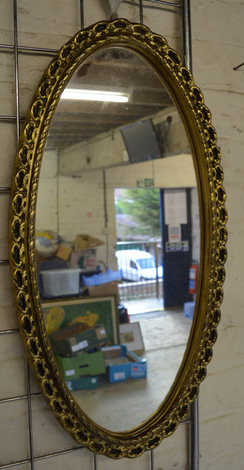 Oval gilt framed mirror