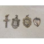 Silver crucifix, locket and two silver w