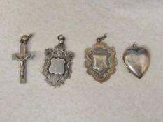 Silver crucifix, locket and two silver w