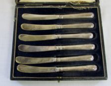 Cased set of silver handled butter knive