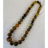 String of 37 natural form amber beads le