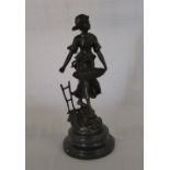 Bronze figure of a lady with basket H 33