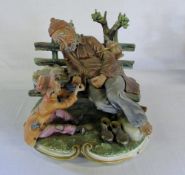 Large Capodimonte figure of a tramp and