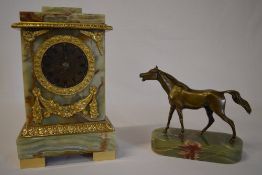 An onyx cased mantle clock and a bronze