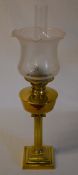 Brass paraffin lamp with etched glass sh