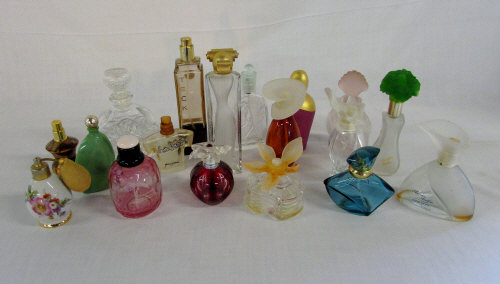 Assorted empty perfume bottles