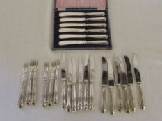 Silver handled knives and pickle forks S